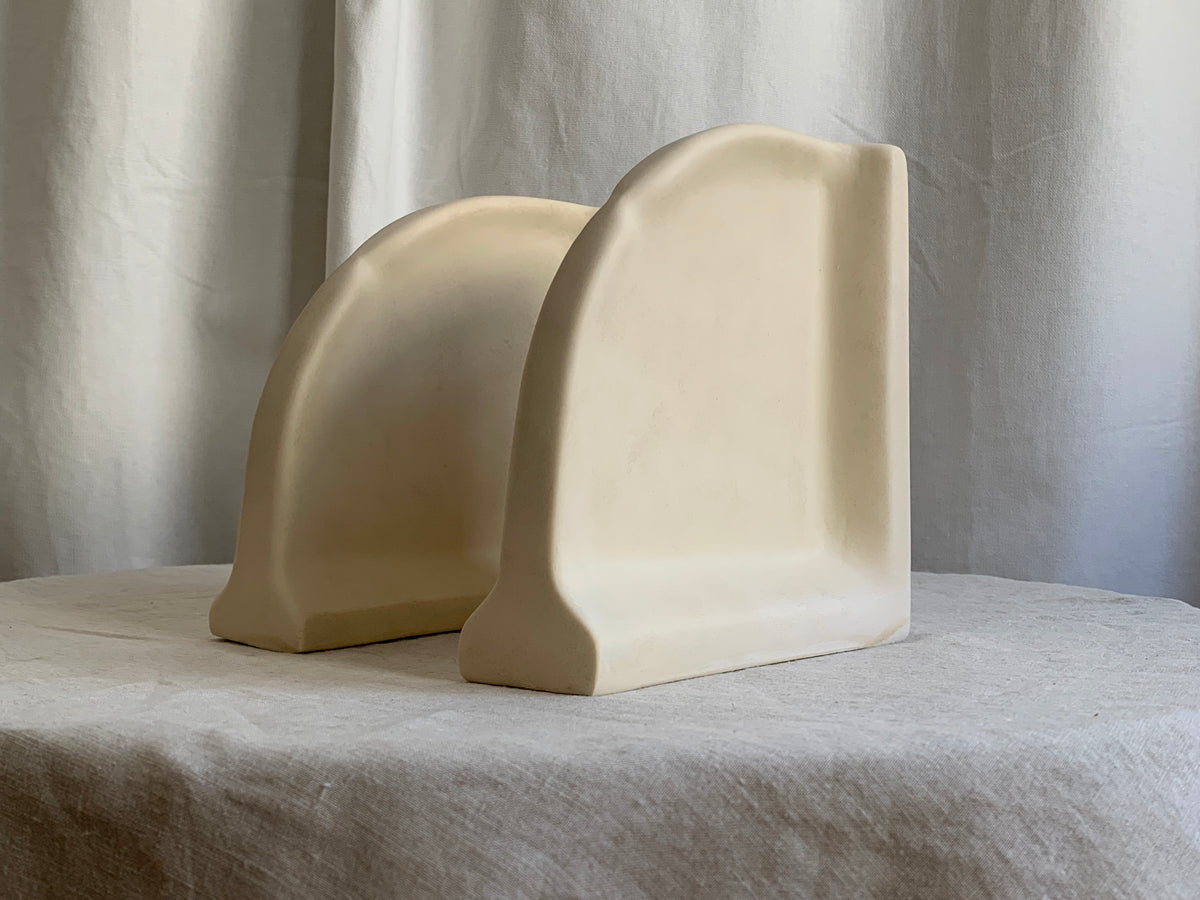 Postmodern Pinched Arc Sculptural Cast Ceramic Bookends