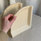 Postmodern Pinched Arc Sculptural Cast Ceramic Bookends